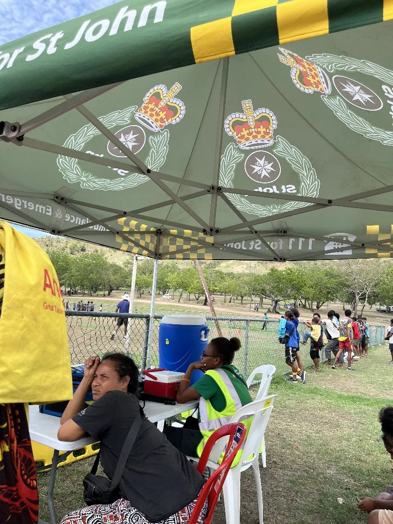 Athletes and volunteers share a sports activity