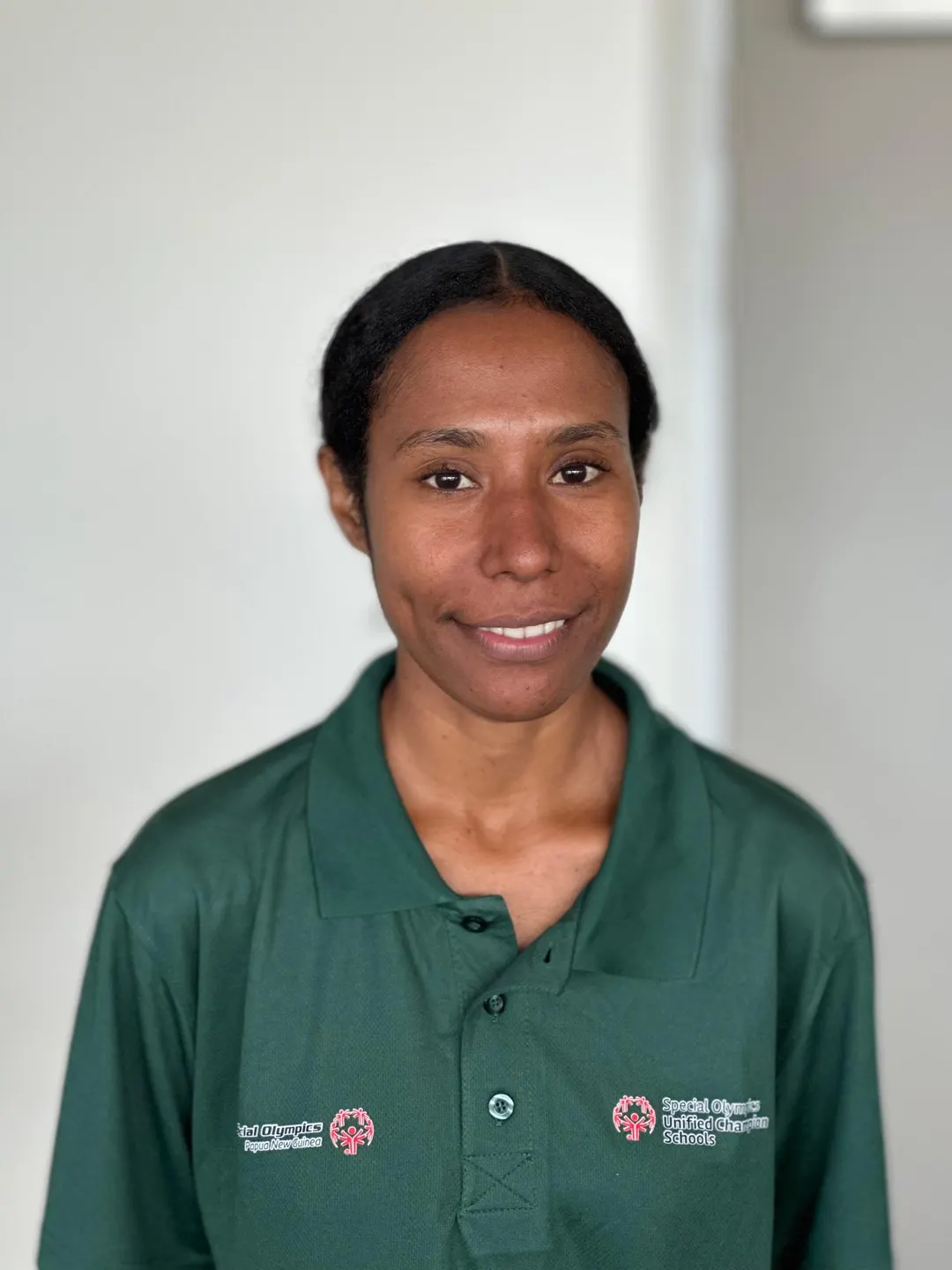 Volunteer portrait; name and position to be added.
