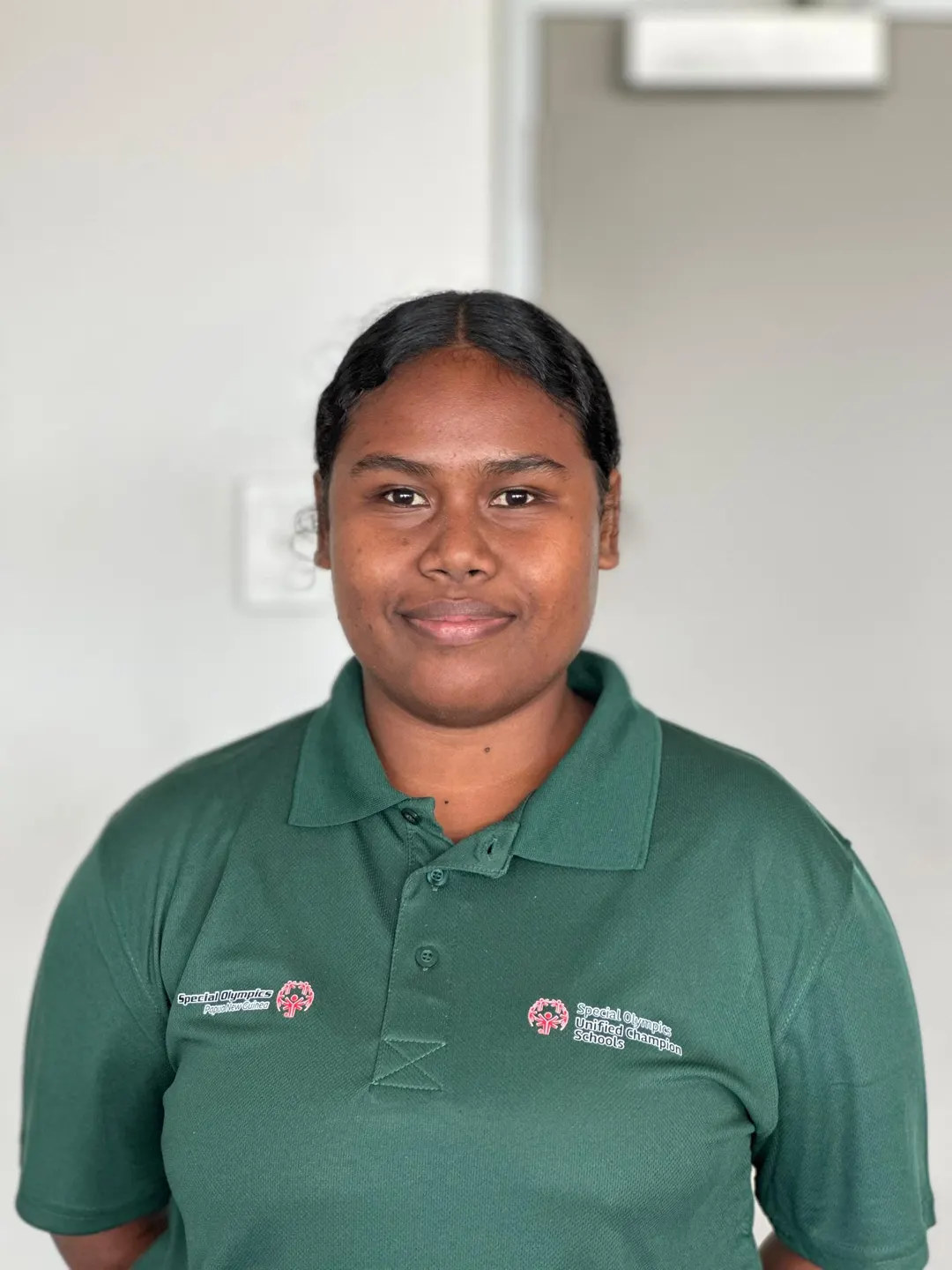 Volunteer portrait; name and position to be added.