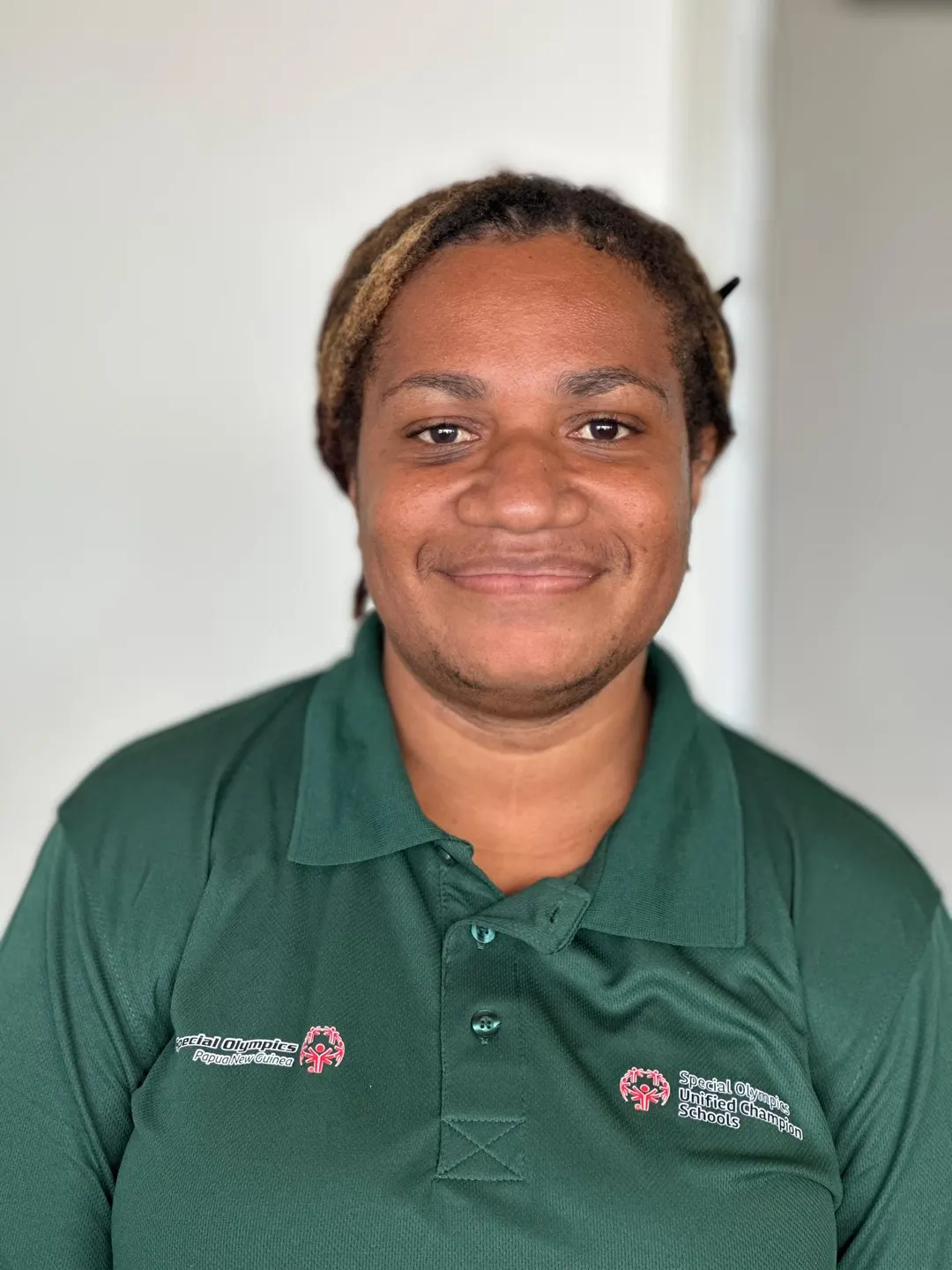 Volunteer portrait; name and position to be added.
