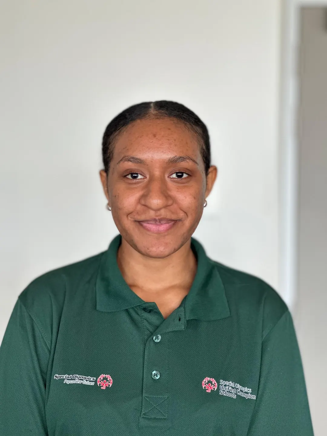 Volunteer portrait; name and position to be added.