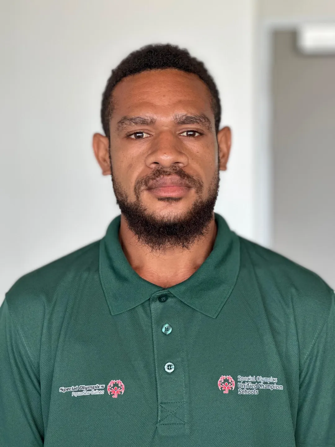 Volunteer portrait; name and position to be added.