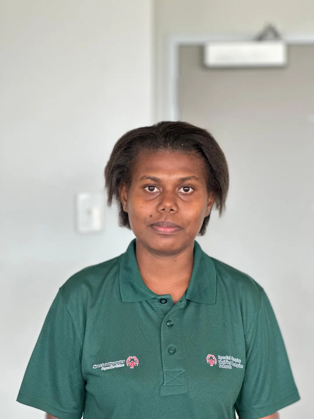 Volunteer portrait; name and position to be added.